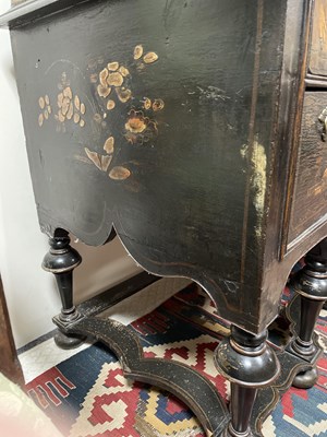 Lot 299 - An 18th Century and later black lacquer and gilt chinoiserie decorated chest on stand