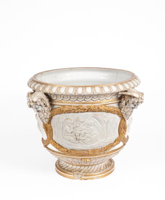 Lot 82 - A 19th Century Continental bisque porcelain and gilt decorated jardinière