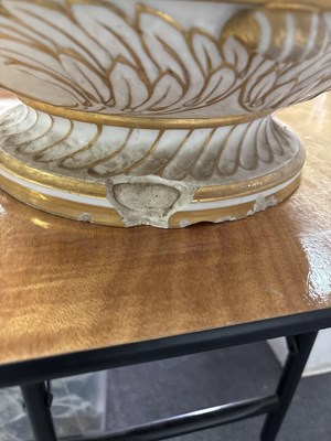 Lot 82 - A 19th Century Continental bisque porcelain and gilt decorated jardinière