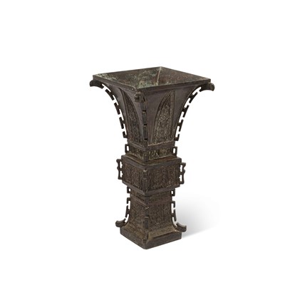 Lot 566 - A bronze Zun vase
