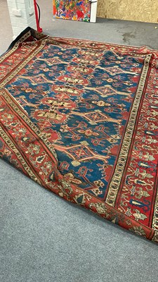 Lot An unusual West Persian carpet