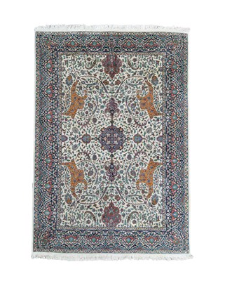 Lot 419 - An Indian carpet of Tabriz design