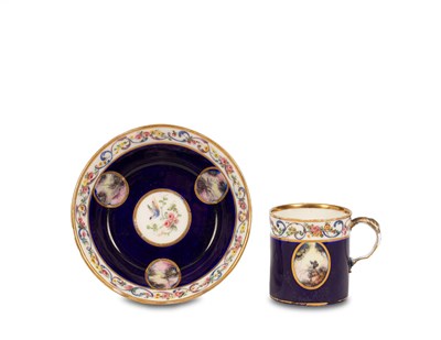 Lot 524 - A Sèvres style coffee can and saucer