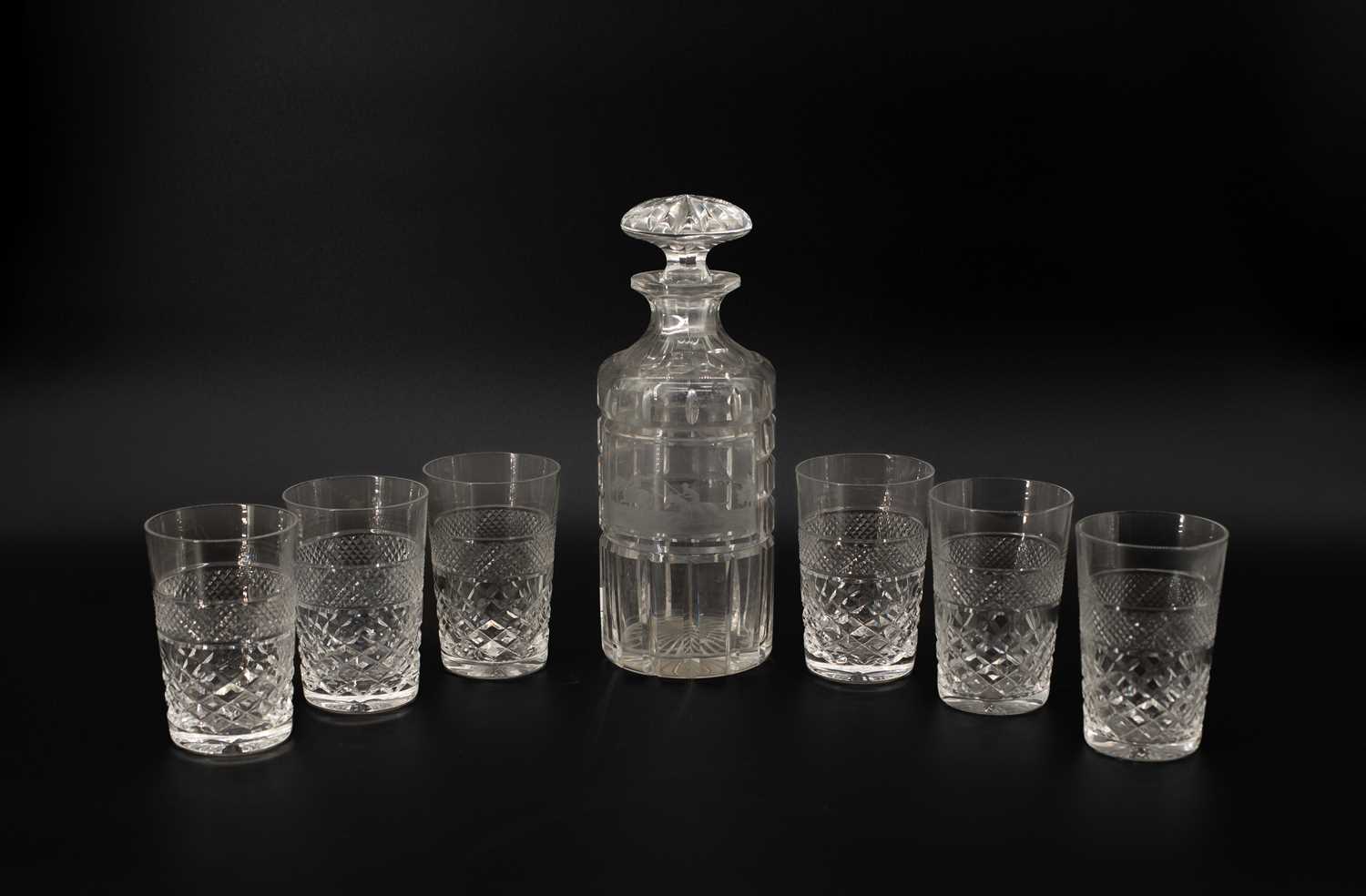 Lot 117 - A cylindrical cut glass decanter and stopper