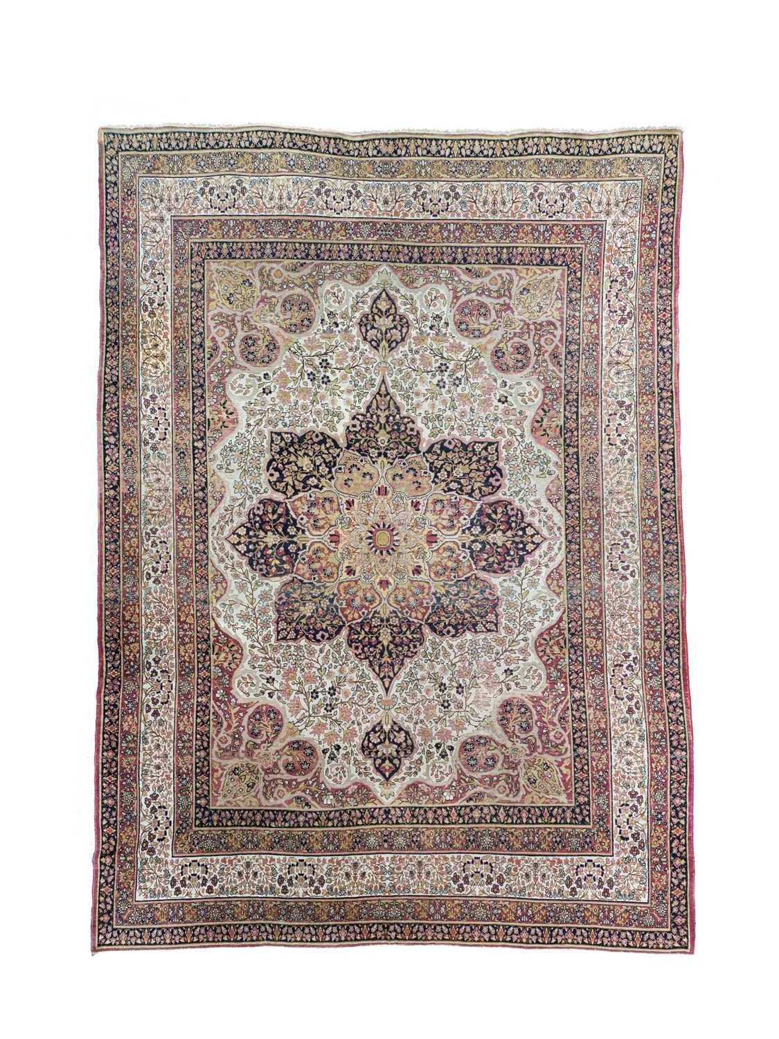 Lot 407 - A Kirman Lavar carpet