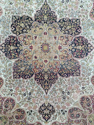 Lot 407 - A Kirman Lavar carpet