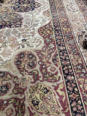 Lot 407 - A Kirman Lavar carpet