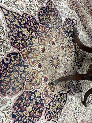 Lot 407 - A Kirman Lavar carpet