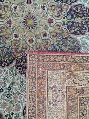 Lot 407 - A Kirman Lavar carpet