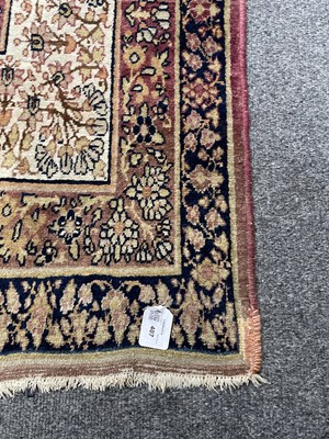 Lot 407 - A Kirman Lavar carpet