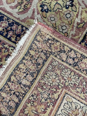 Lot 407 - A Kirman Lavar carpet