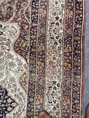 Lot 407 - A Kirman Lavar carpet