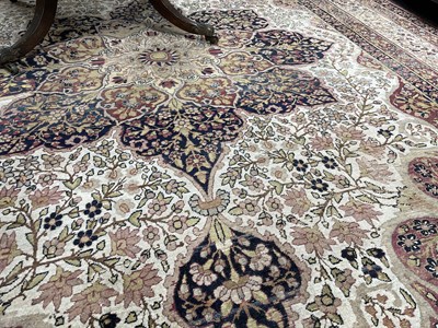 Lot 407 - A Kirman Lavar carpet