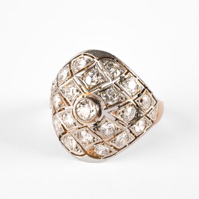 Lot 300 - A yellow gold and diamond bombe cocktail ring