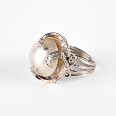 Lot 301 - A pearl and diamond cocktail ring