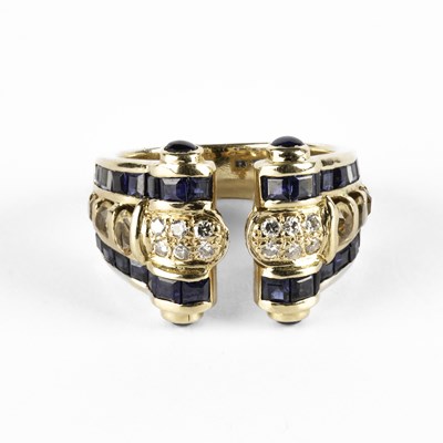 Lot 310 - An 18k yellow gold diamond, sapphire and yellow stone dress ring