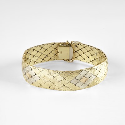 Lot 316 - A 14k tri-colour gold articulated bracelet