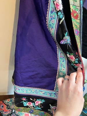 Lot 650 - A Chinese purple silk robe