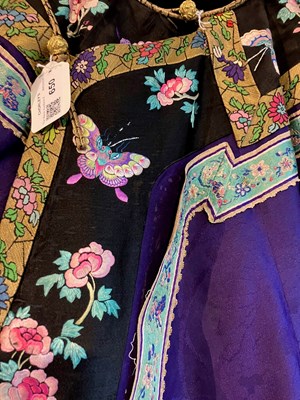Lot 650 - A Chinese purple silk robe