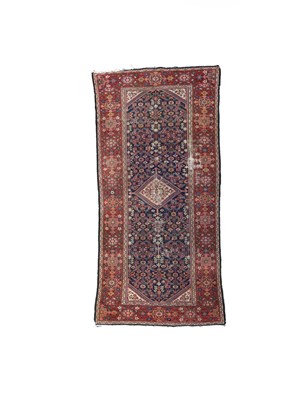 Lot 286 - A Feraghan long rug