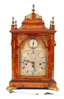 Lot 375 - A walnut veneered quarter chiming verge bracket clock