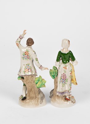 Lot 74 - A German porcelain figural centre bowl and matching pair of low candlesticks