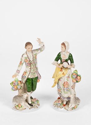 Lot 74 - A German porcelain figural centre bowl and matching pair of low candlesticks
