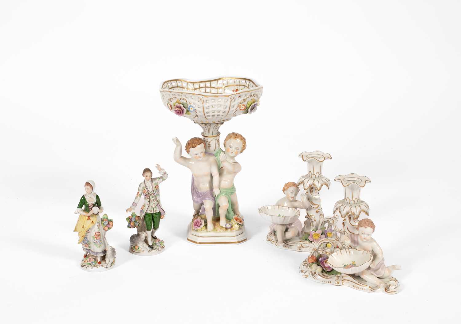 Lot 74 - A German porcelain figural centre bowl and matching pair of low candlesticks