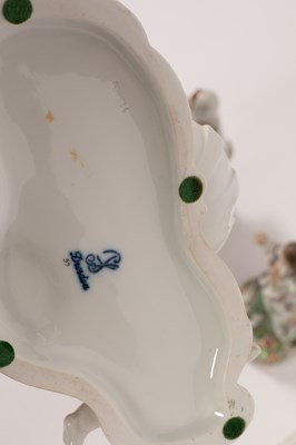 Lot 74 - A German porcelain figural centre bowl and matching pair of low candlesticks