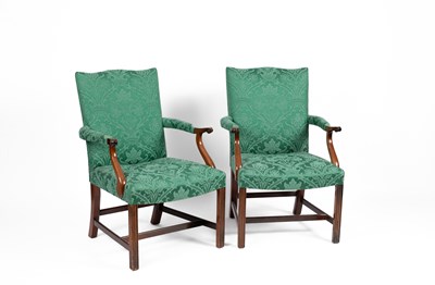 Lot 627 - A pair of George III style mahogany Gainsborough chairs by Saybolt & Cleland