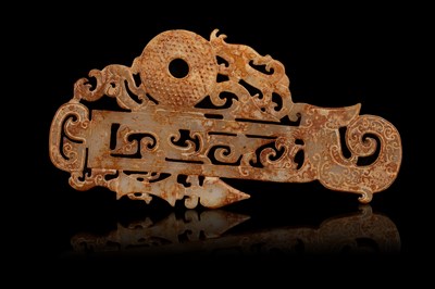 Lot 597 - A Han style jade plaque