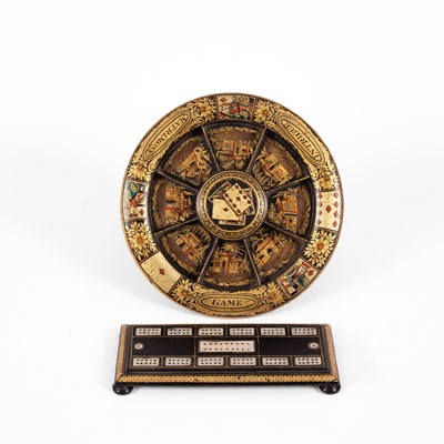 Lot 446 - An early 19th Century black japanned Pope Joan board