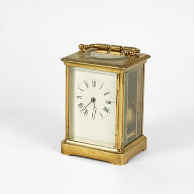 Lot 711 - A gilt brass cased bell striking carriage clock