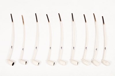 Lot 432 - Nine Goedewaagen long clay pipes