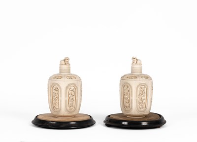 Lot 465 - A pair of Chinese carved ivory jars and covers