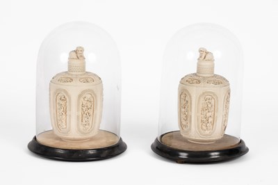 Lot 465 - A pair of Chinese carved ivory jars and covers