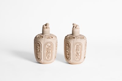 Lot 465 - A pair of Chinese carved ivory jars and covers