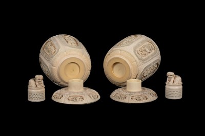 Lot 465 - A pair of Chinese carved ivory jars and covers