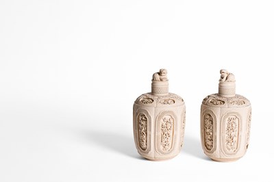 Lot 465 - A pair of Chinese carved ivory jars and covers