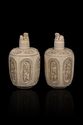 Lot 465 - A pair of Chinese carved ivory jars and covers