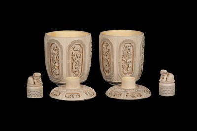 Lot 465 - A pair of Chinese carved ivory jars and covers