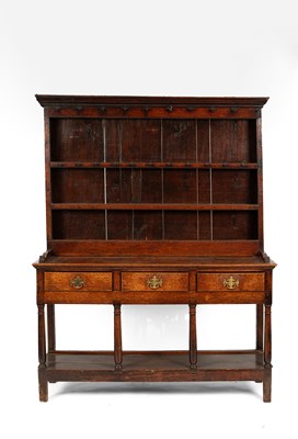 Lot 686 - A late 18th/early 19th Century oak dresser