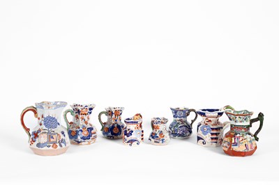 Lot 365 - Eight Ironstone jugs