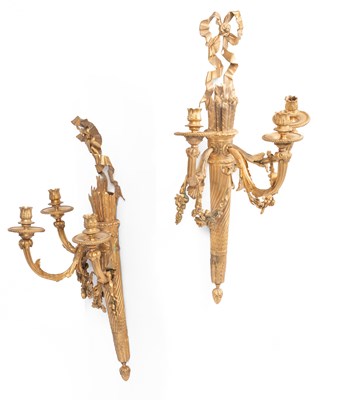 Lot 425 - A pair of 20th Century Neo-Classical style gilt metal three light wall sconces