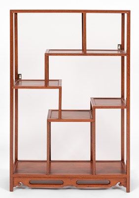 Lot 636 - A Chinese hardwood display shelf