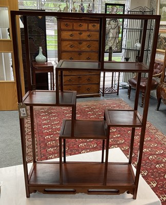 Lot 636 - A Chinese hardwood display shelf