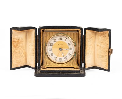 Lot 705 - A small Zenith travelling alarm clock