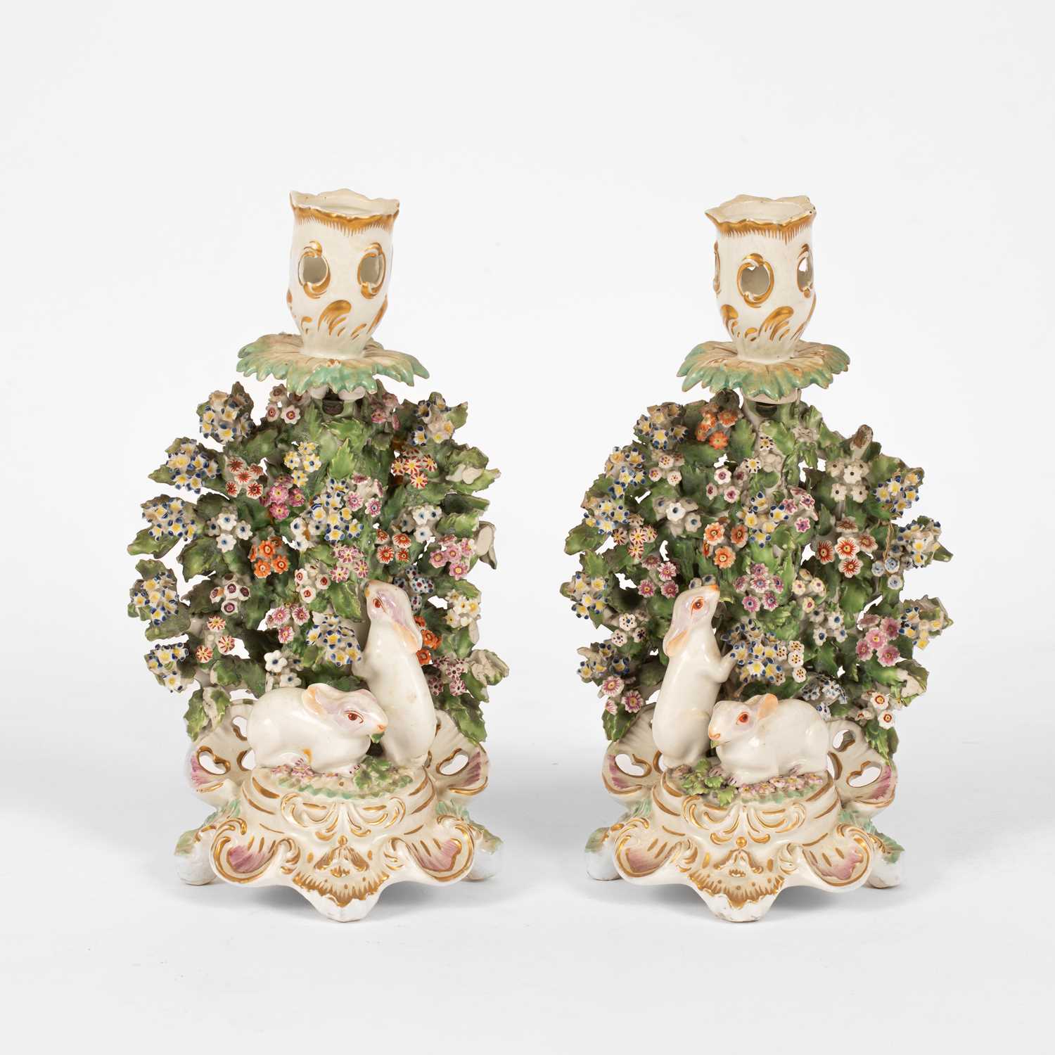 Lot 534 - A pair of Derby candlesticks