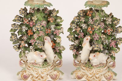 Lot 534 - A pair of Derby candlesticks