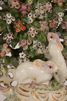 Lot 534 - A pair of Derby candlesticks